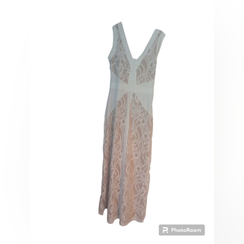 Candalite Small Sleeveless Maxi White Lace Dress with Nude Layer Underneath.